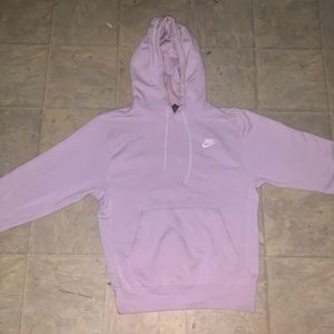 Pink Nike sweater.